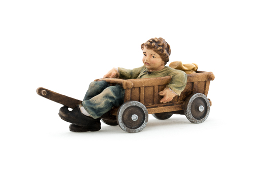 Junge im Handwagen, Länge 9,5 cm in color, Holzfigur, Kunstgewerbeartikel - kein Kinderspielzeug
